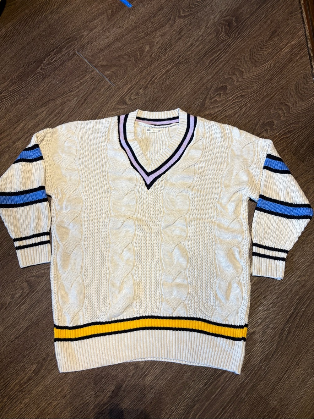 Cream V-Neck Cable-Knit Sweater with Blue and Yellow Stripe Details